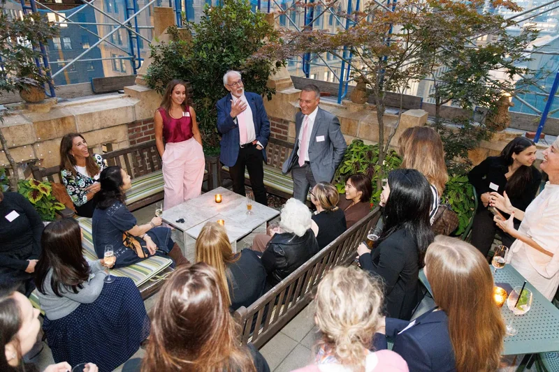 Bob addressing a group gathered on a terrace during Climate Week